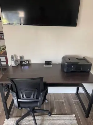 a desk with a printer and a chair in a room at Elegant private studio with private entrance and pool access in San Gabriel
