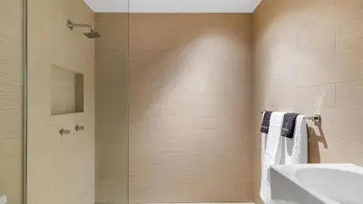 a bathroom with a shower and a sink at Kings Road West Hollywood Luxury Pool Views Firepit Modern Design in Los Angeles