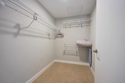 a room with a hallway with a walk in closet at Hollywood Escape! Elegant 2BR 2BA Rental in Los Angeles