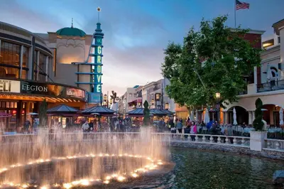 a fountain in the middle of a shopping center with people at Hollywood Escape! Elegant 2BR 2BA Rental in Los Angeles