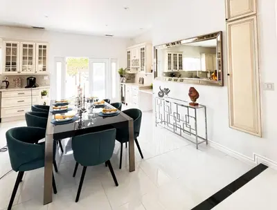 a kitchen with a dining room table and chairs at Luxury Oasis in Central Encino w Pool & Spa Topeka in Los Angeles