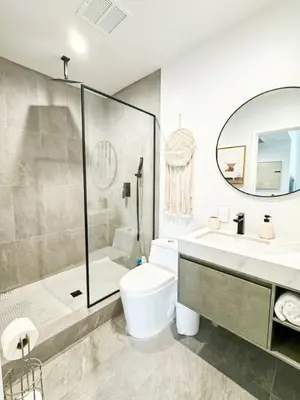 a bathroom with a toilet and a sink and a shower at Sunny 1BR with Large Outdoor Lounge Space - SH4LAD in Los Angeles