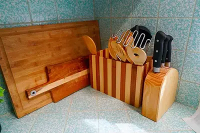 a wooden knife block with a bunch of knives at Beautiful Renovated Cozy Forest Home with Hot Tub in Crestline in Crestline