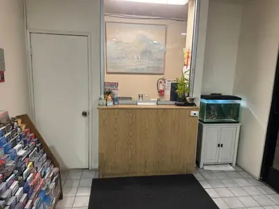 a bathroom with a sink and a fish tank at Best Star Inn - Montebello, Los Angeles in Montebello