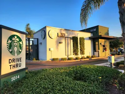 a drive thru sign in front of a building at Charming Bedroom Near Disney Land, Orange County in La Palma