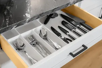 a drawer filled with silver utensils in a kitchen at Luxurious Newly Remodeled 4 Bedroom Home with Large Backyard near Disneyland in Anaheim