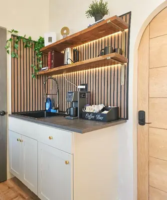 a kitchen with a sink and a counter top at Brimfield Stay in Los Angeles