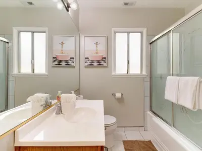 a white bathroom with a sink and a toilet at Modern 4 bedroom in San Fernando in San Fernando