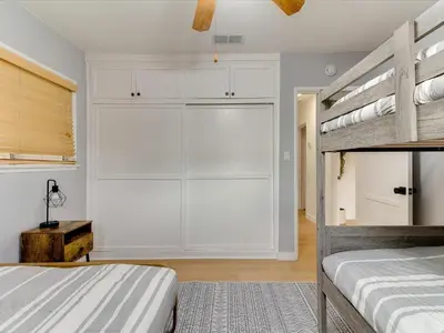 a bedroom with a bed and a large closet at Modern 4 bedroom in San Fernando in San Fernando