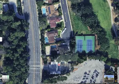 an overhead view of a street with houses and a road at Adorable 4 bedroom home with Pool & more in Los Angeles