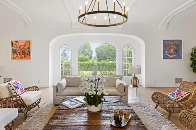 a living room with a couch and a table at Mediterranean Dream Villa Oasis in Los Angeles