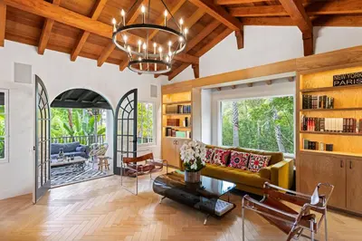 a living room with a couch and a table at Mediterranean Dream Villa Oasis in Los Angeles