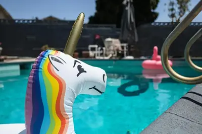 a unicorn toy next to a swimming pool at Charming 2BR Spot Near LAX, SoFi and Forum - MK1-LAD in Los Angeles