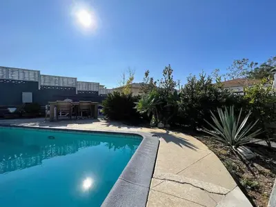a swimming pool in a yard with a patio at Charming 2BR Spot Near LAX, SoFi and Forum - MK1-LAD in Los Angeles