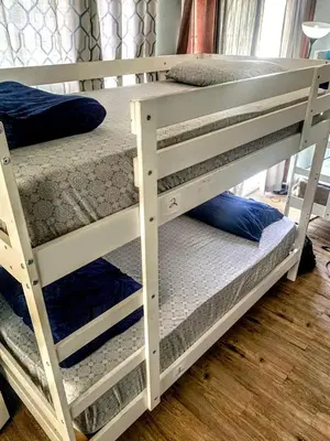 two sets of bunk beds in a room at Homes for Soul Los Angeles in Los Angeles