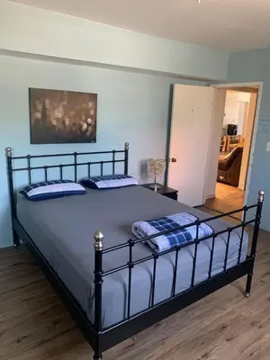 a bed with two pillows on it in a bedroom at Homes for Soul Los Angeles in Los Angeles