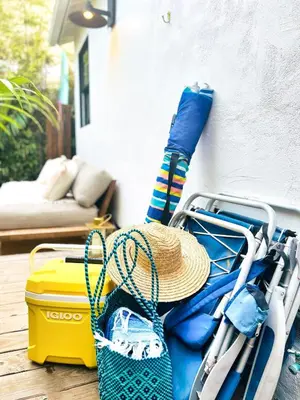 a cart with a straw hat and other items at Channel Islands Beach Retreat in Oxnard