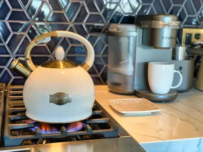 a tea kettle sitting on top of a stove at Channel Islands Beach Retreat in Oxnard