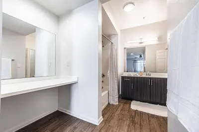 a bathroom with a sink and a mirror at Modern Townhouse with 4 Bedrooms Near LAX in Los Angeles