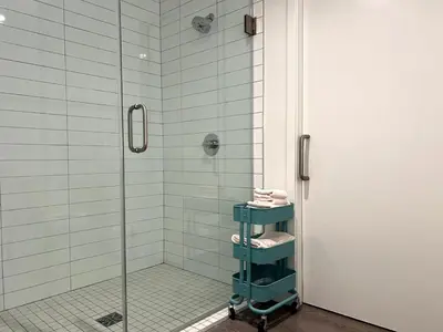 a bathroom with a shower with a glass door at Cozy apartment in Santa Monica parking, Gym, Pool in Los Angeles