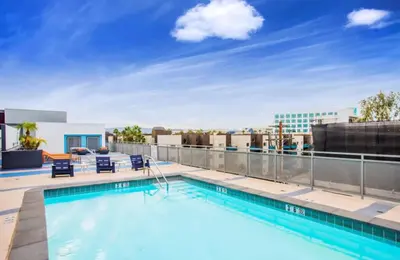 a swimming pool on the roof of a building at Sunset Duo 2 bedroom Charm with FREE Parking in Los Angeles