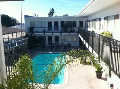 a swimming pool in the backyard of a house at west hollywood condo in Los Angeles