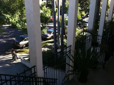 a girl walking down the stairs of a building at west hollywood condo in Los Angeles