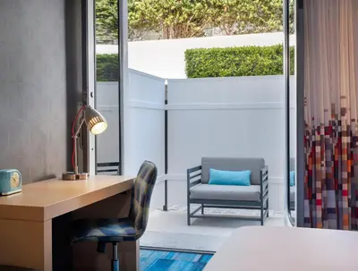 an office with a desk and a chair at Aloft El Segundo - Los Angeles Airport in El Segundo