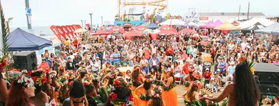 a large crowd of people at a carnival at Spinel Stay - Charming 2BR Retreat Zen Garden Views Central in Los Angeles