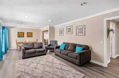a living room with two couches and a table at Anaheim Dream Haven-disneyland Pool Foosball in Anaheim