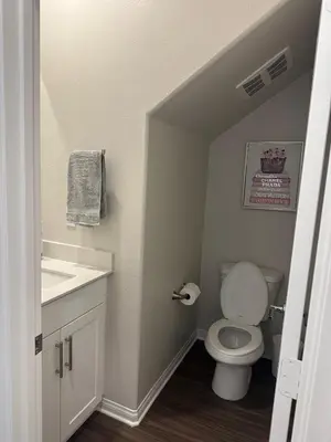 a small bathroom with a toilet and a sink at Gated Upland Home 3b 3 bath in Upland