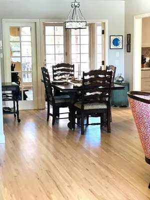 a dining room with a table and chairs at UNIQUE SPANISH HACIENDA HOUSE with POOL VINTAGE 1948 EUROPEAN ANTIQUES ETHNIC ART in Bakersfield