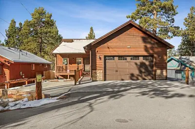 a house with a garage and a barn at High Altitude Retreat in Big Bear Lake
