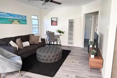 a living room with a couch and a table at Fully remodeled 1 bedroom in prime West Hollywood in Los Angeles