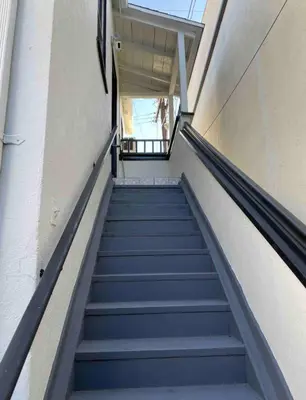 a staircase leading up to a building at Fully remodeled 1 bedroom in prime West Hollywood in Los Angeles
