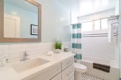 a bathroom with a sink and a toilet and a mirror at Sunny 1 Bedroom in the Heart of Venice Beach - #4 in Los Angeles