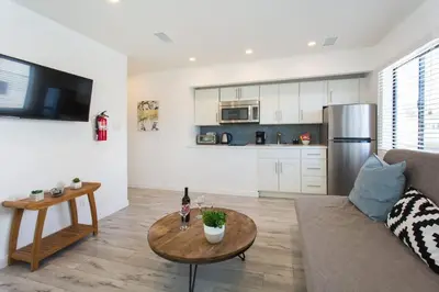 a living room with a couch and a table at Sunny 1 Bedroom in the Heart of Venice Beach - #4 in Los Angeles