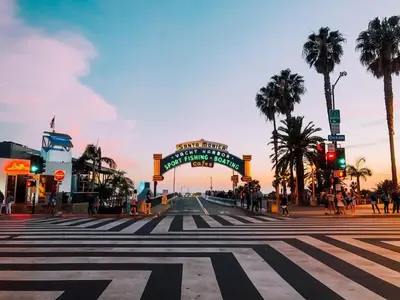 a city street with a crosswalk in front of a building at Beachside 2BD 2BA, 12Min Walk to Santa Monica Pier in Los Angeles