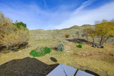 an aerial view of a field with trees and mountains at Mtn-View Weldon Home Walk to Pacific Crest Trail in Weldon