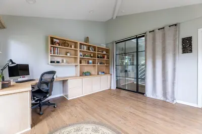 a home office with a desk and a chair at Tranquil family beach city retreat in Redondo Beach