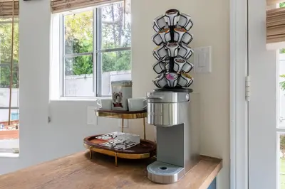 a room with a coffee machine on a table at Tranquil family beach city retreat in Redondo Beach