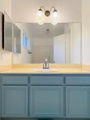 a bathroom with a sink and a large mirror at 1b1b Private and quiet sun roomA in Rancho Cucamonga