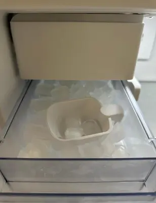 a drawer with a white bowl in the inside of a refrigerator at Heart of Hollywood-Walk of Fame 1bd Studio with View -Free parking, balcony, wifi, rooftop, gym, upscale amenities in Los Angeles