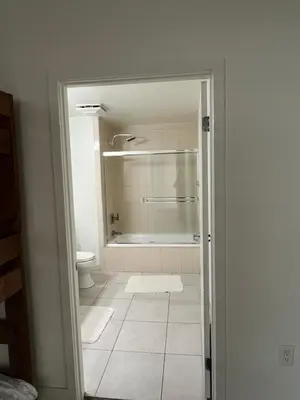a bathroom with a shower and a tub and a toilet at HollywoodNorth in Los Angeles