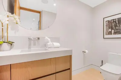 a bathroom with a sink and a toilet at Hutton Modern in Beverly Hills