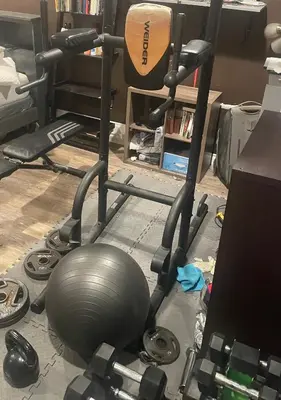 a room with a exercise ball and a exercise bike at Sofi Intuit Forum Vacation Oasis in Los Angeles