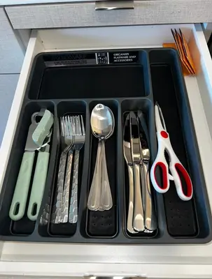 a tray with silver utensils in a drawer at Modern Hollywood Walk of Fame Apts- Free Parking, 360 Rooftop, Pool, Gym- Centrally located in Los Angeles