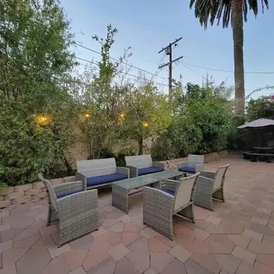 3 bedroom guest suite first floor unit with nice patio area right next to the MrC Hotel 10 minutes from Rodeo Drive Washer Dryer WIFI and more