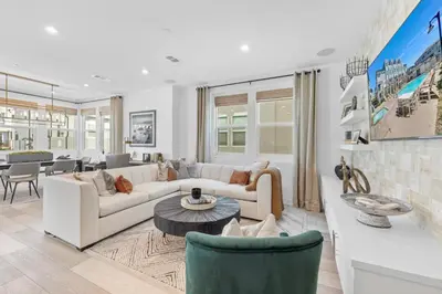 a living room with a couch and a table at #Marbella Lane-Luxury Designer 3BR Home Disneyland in Anaheim
