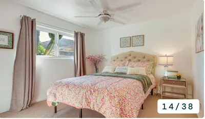 a bedroom with a bed and a window at Emeric Estate in Simi Valley